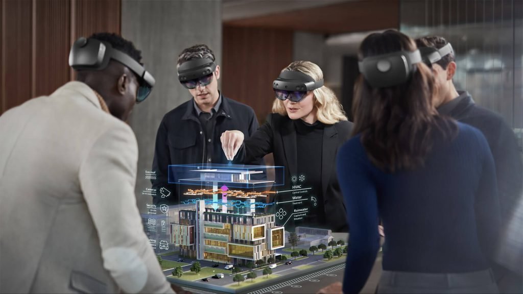 A group of engineers wearing masks discussing architecture of a bldg using MR technology
