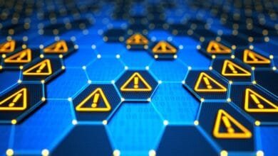 Abstract digital network with glowing hexagonal nodes displaying warning signs, indicating potential system errors or security breaches.
