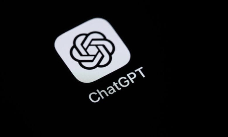 Close-up of the ChatGPT app icon and text on an iPhone screen. The icon is a white stylized shape on a black background.