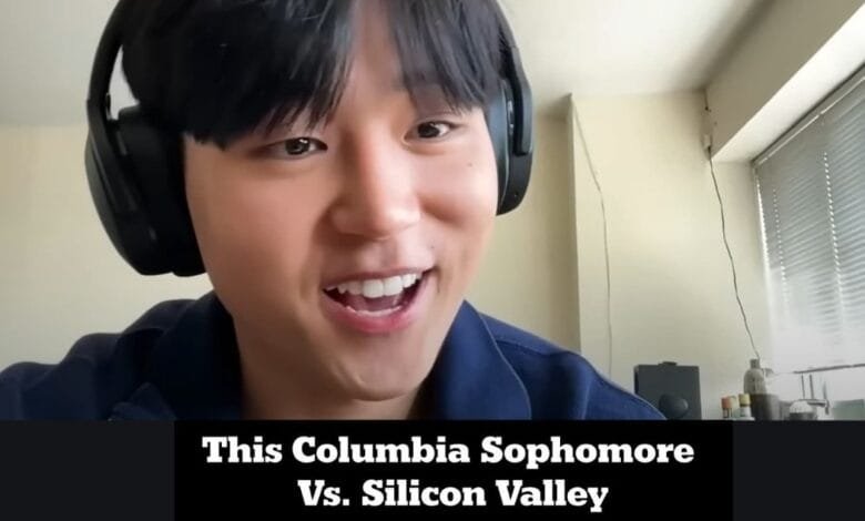 Close-up of a smiling young man wearing headphones. Text overlay: 'This Columbia Sophomore Vs. Silicon Valley'