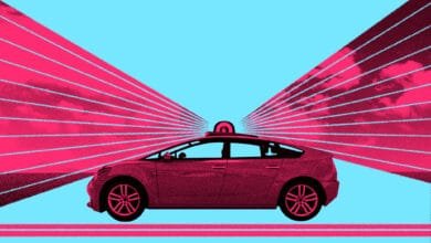 Stylized illustration of a self-driving car on a light blue background, with pink rays emanating from it, suggesting speed and technology.