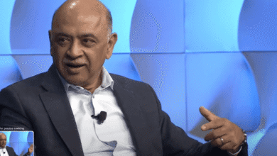 Raghu Raghuram, VMware CEO, speaks at a conference, gesturing with his hand.