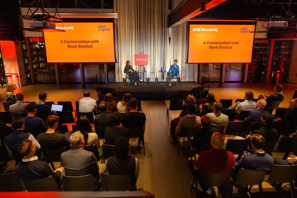 Audience listens to Mark Rostick at a StrictlyVC event sponsored by Intel Capital. Two speakers are on stage.