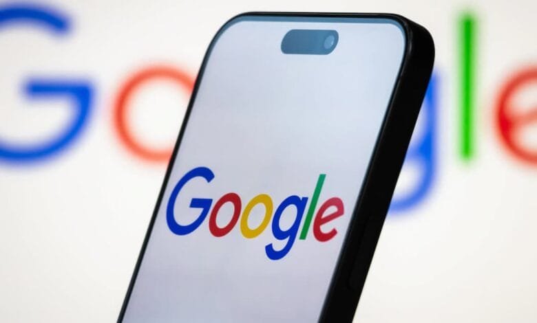Mobile and screen displaying "Google"