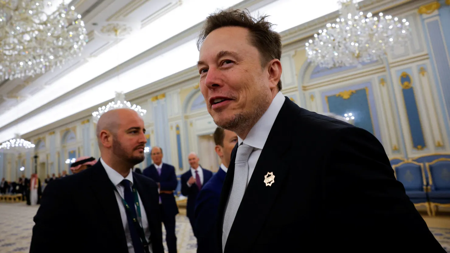 Tesla CEO Elon Musk looks on as he visits Riyadh with U.S. President Donald Trump, in Riyadh, Saudi Arabia, on May 13, 2025.
