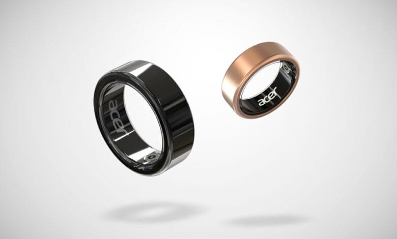 Two Acer FreeSense rings, one black and one rose gold, float against a white background.