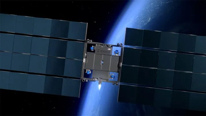 Aetherflux satellite in Earth orbit, showcasing its dark-grey body and expansive solar panels against a backdrop of a blue planet.