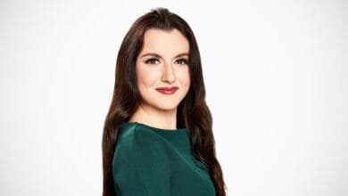 Headshot of Fidji Simo, CEO of Instacart, wearing a dark green dress against a white background.