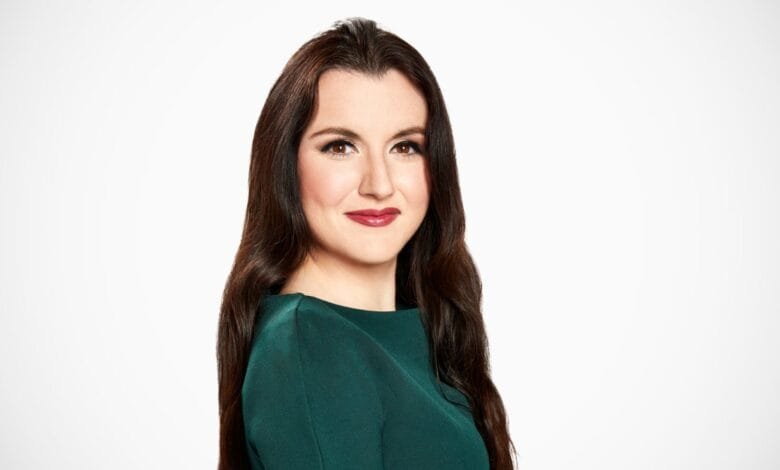Headshot of Fidji Simo, CEO of Instacart, wearing a dark green dress against a white background.
