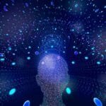 Abstract digital art depicting a head formed from glowing particles, with more particles radiating outwards.