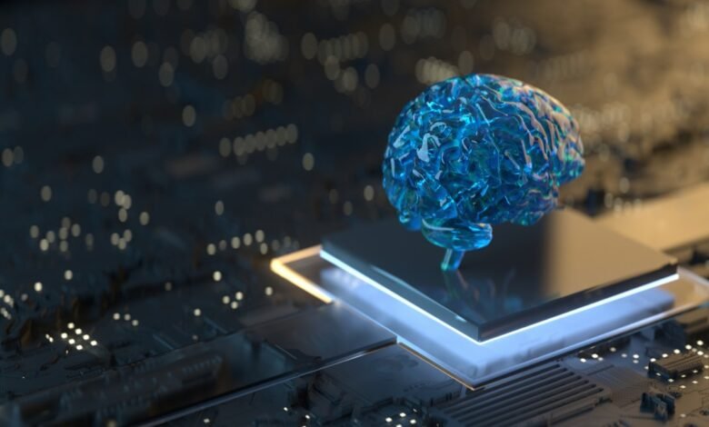 A translucent blue brain model rests atop a glowing computer chip, symbolizing AI and technological advancement.
