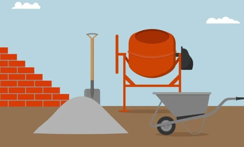 Construction scene: cement mixer, wheelbarrow, shovel, and brick wall. Ready for building!