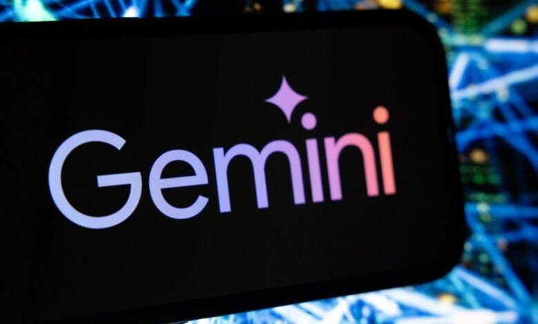 Gemini cryptocurrency exchange logo on a smartphone screen, with a blurred background of blue and green network cables.