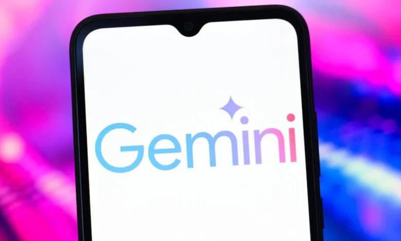 Close-up of a smartphone displaying the Google Gemini AI logo in pastel blue and pink.