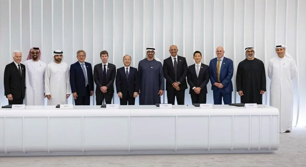 Pictured in the image, from left to right:Marty Edelman, General Counsel of G42; HH Sheikh Tahnoon bin Zayed Al Nahyan, National Security Adviser, Deputy Ruler of Abu Dhabi and Chairman of Artificial Intelligence and Advanced Technology Council (AIATC);HH Sheikh Hamdan bin Mohammed Al Maktoum, Crown Prince of Dubai and Deputy Prime Minister;Jensen Huang, Founder and CEO of NVIDIA;Sam Altman, Co-founder and CEO of OpenAI;Masayoshi Son, Chairman and CEO of SoftBank Group;HH Sheikh Mohamed bin Zayed Al Nahyan, President of the United Arab Emirates;Jeetu Patel, President and Chief Product Officer of Cisco;Peng Xiao, Group CEO of G42;Mike Sicilia, EVP Global Industries of Oracle;HH Sheikh Khaled bin Mohamed bin Zayed Al Nahyan, Crown Prince of Abu Dhabi, Chairman of the Abu Dhabi Executive Council and Vice-Chairman of AIATC;HE Khaldoon Al Mubarak, Managing Director and Group Chief Executive Officer of Mubadala Investment Company and Member of the AIATC.