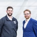 Joshua Western, CEO, and Andrew Bacon, CTO, of Space Forge, stand together smiling.