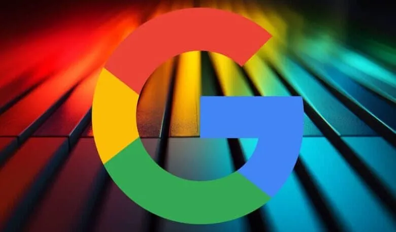 Google logo in vibrant colors superimposed on a colorful, textured background resembling piano keys.