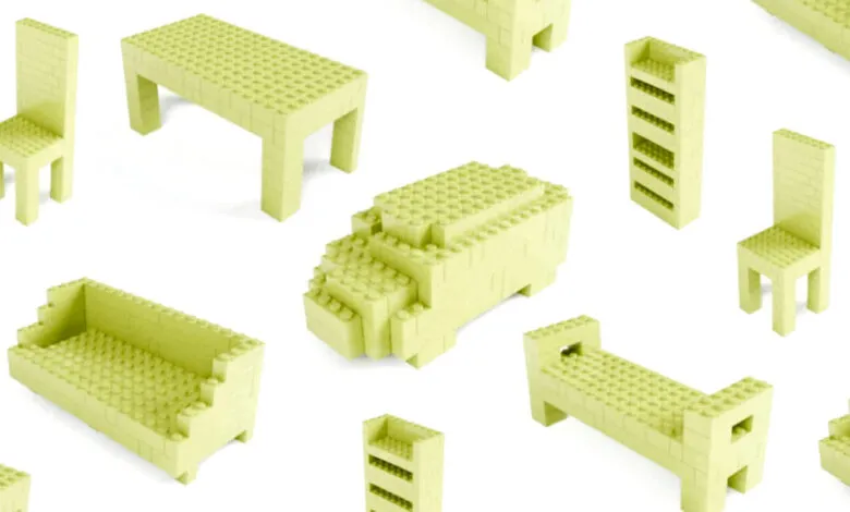 Pastel yellow Lego furniture: chairs, tables, sofa, and shelves, arranged on a white background.