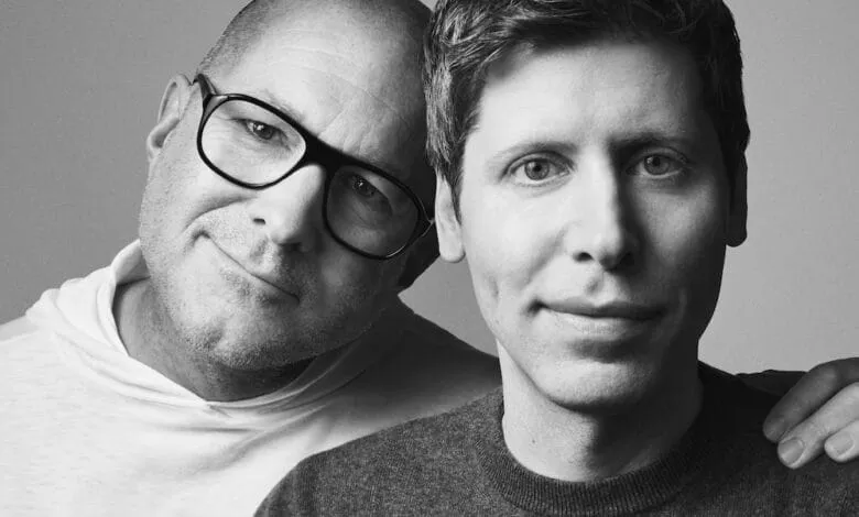 Black and white portrait of Sam Altman and Johnny Ive, Ive with glasses, shoulder to shoulder.