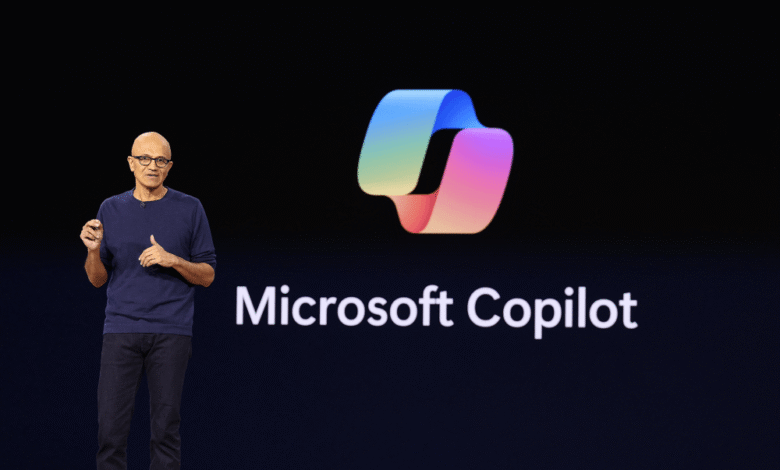 Satya Nadella, Microsoft CEO, presents Microsoft Copilot, a new AI system. A colorful abstract logo is displayed.