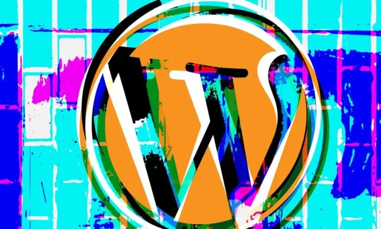 Abstract artwork featuring the WordPress logo overlaid on a vibrant, multicolored, graffiti-style background.