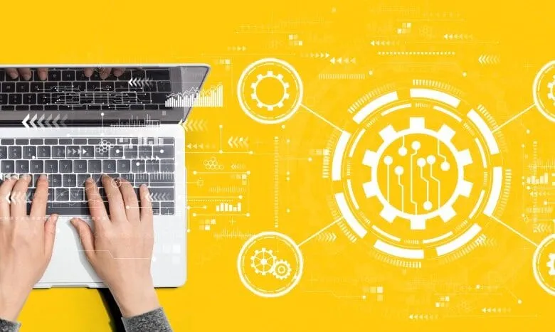 Hands typing on a laptop against a yellow background, with overlaid graphics representing technology and process automation.