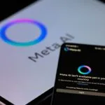 Close-up of a tablet and smartphone displaying the Meta AI logo and a message indicating the service is unavailable in the user's country.