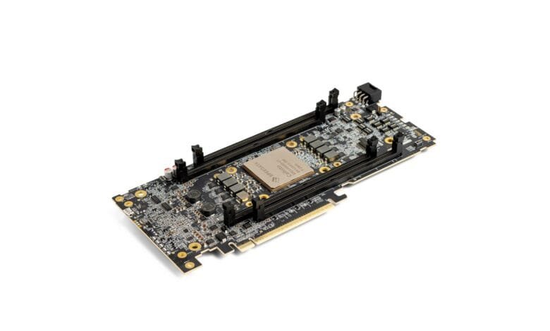 Close-up of a Speedata APU credit card-sized computer board with multiple chips and connectors.