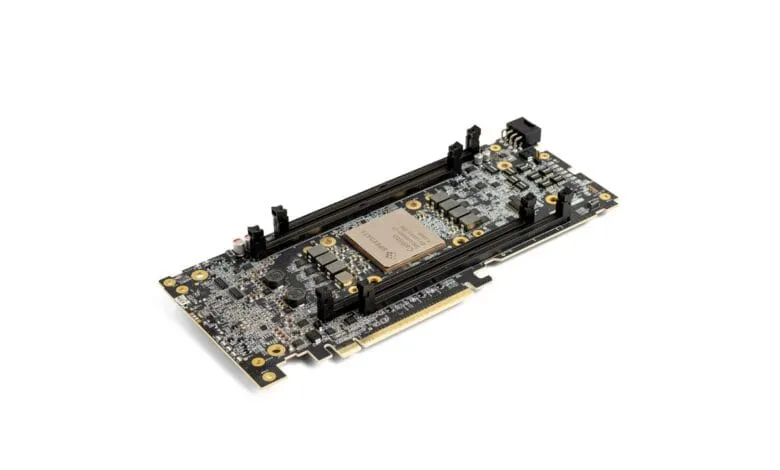 Close-up of a Speedata APU credit card-sized computer board with multiple chips and connectors.