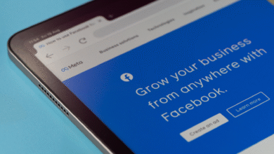 Close-up of a tablet displaying a Meta Facebook ad campaign webpage, promoting business growth with Facebook.