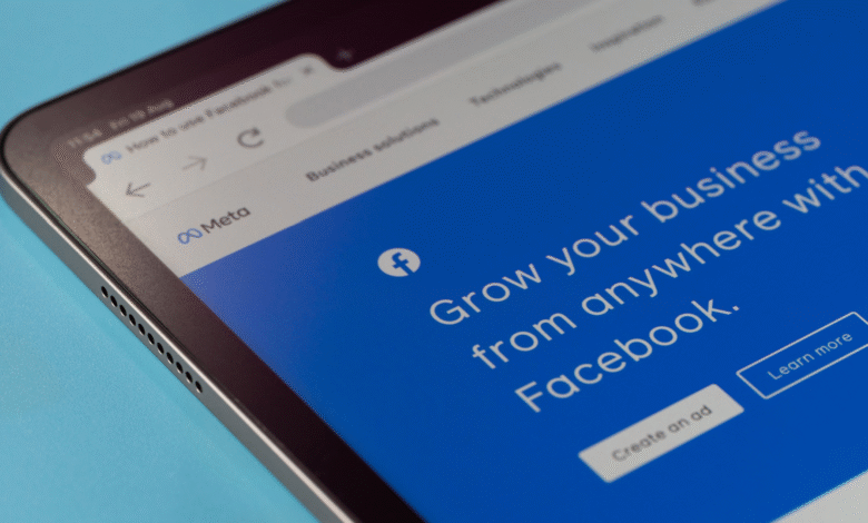 Close-up of a tablet displaying a Meta Facebook ad campaign webpage, promoting business growth with Facebook.