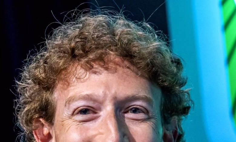 Close-up of Mark Zuckerberg's face, showing his curly hair and eyes.