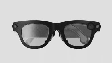 Sleek black smart glasses with a small camera lens on the side.