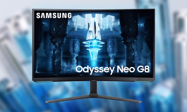 Samsung Odyssey Neo G8 gaming monitor displaying a futuristic, icy scene.
