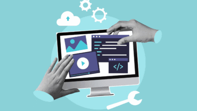 Hands interact with a computer screen displaying website elements like images, videos, and code, symbolizing web design and development.