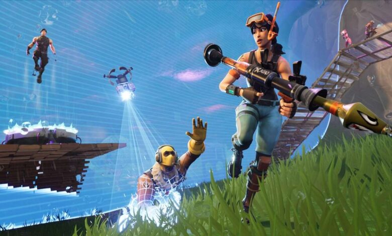 Fortnite gameplay screenshot: A player with a rocket launcher runs, another player is downed, and a drone flies overhead.