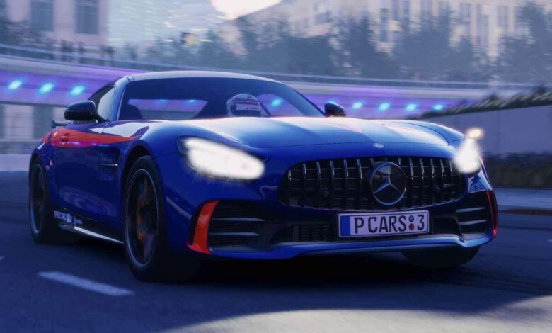 A blue Mercedes-AMG GT Black Series race car speeds along a city street at dusk.