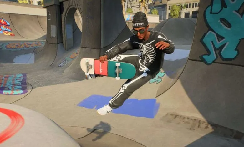 Skateboarder in skeleton costume performs a trick in a skatepark.