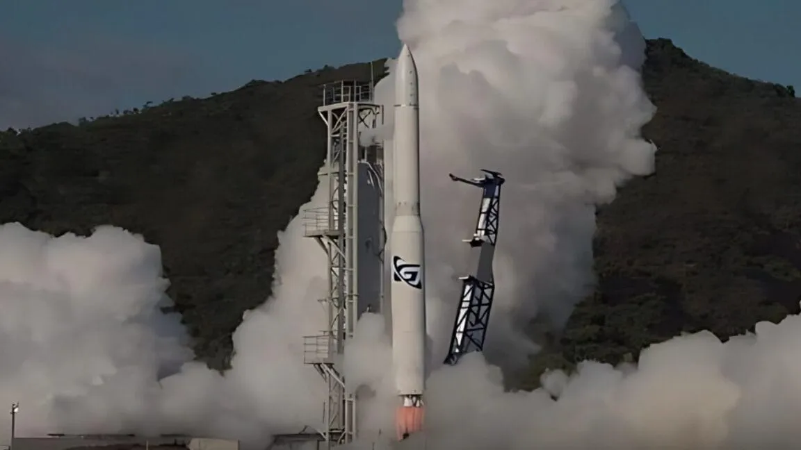 A rocket launches, surrounded by thick white smoke against a backdrop of hills.