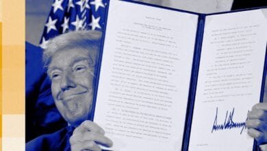 Close-up of Donald Trump holding an executive order document related to AI technology export.