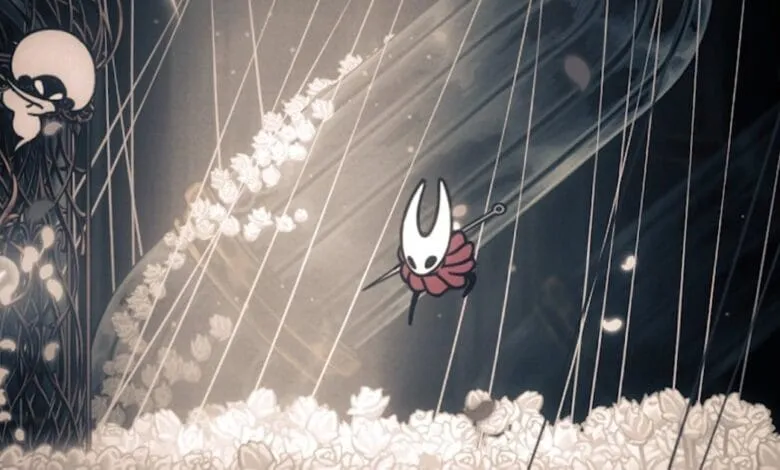 Hornet, the playable character from Hollow Knight: Silksong, navigates a dark, ethereal environment filled with strings and white roses.