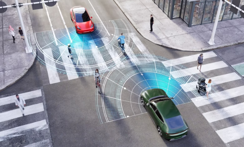 Aerial view of a city intersection with self-driving cars safely navigating pedestrians and cyclists, using advanced sensor technology visualized by blue digital overlays.