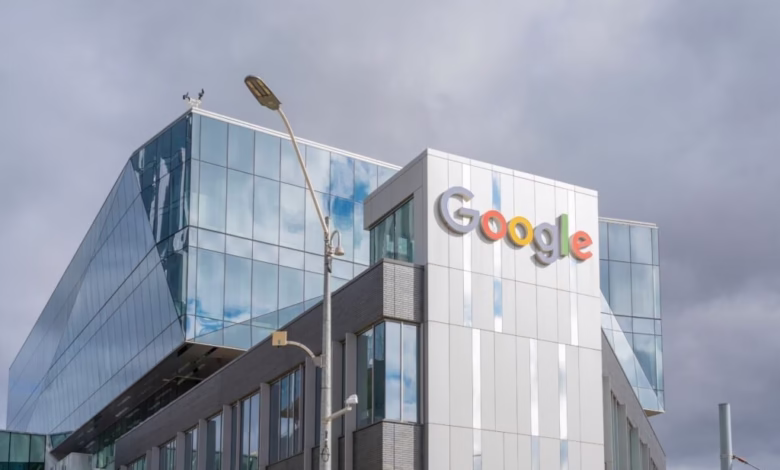 Modern Google office building with glass and metal exterior, featuring the Google logo prominently displayed.