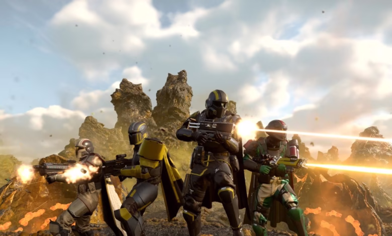 Helldivers 2 gameplay: Four soldiers in yellow and black armor fire powerful weapons amidst a fiery, rocky landscape.