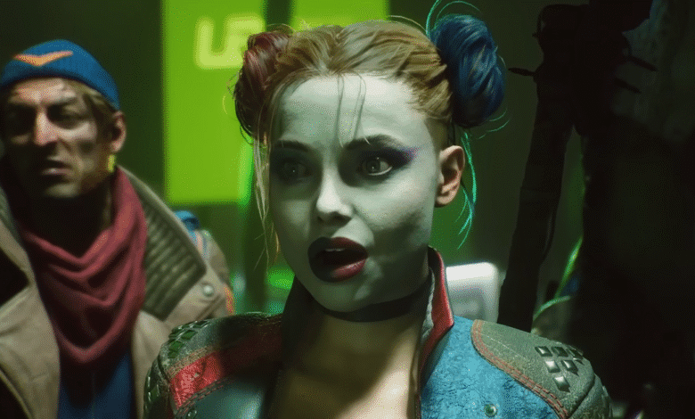 Harley Quinn, with pale face paint and dual-toned hair, looks surprised in a video game scene.