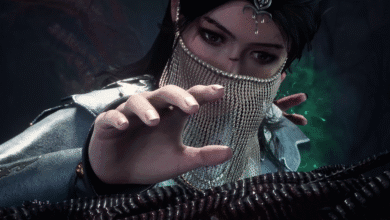 Close-up of a female video game character wearing a silver chain veil, reaching out with a hand. Dark, moody background.