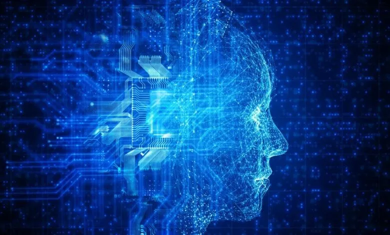 Abstract digital art depicts a human face composed of glowing blue lines and nodes, merging with a circuit board pattern.