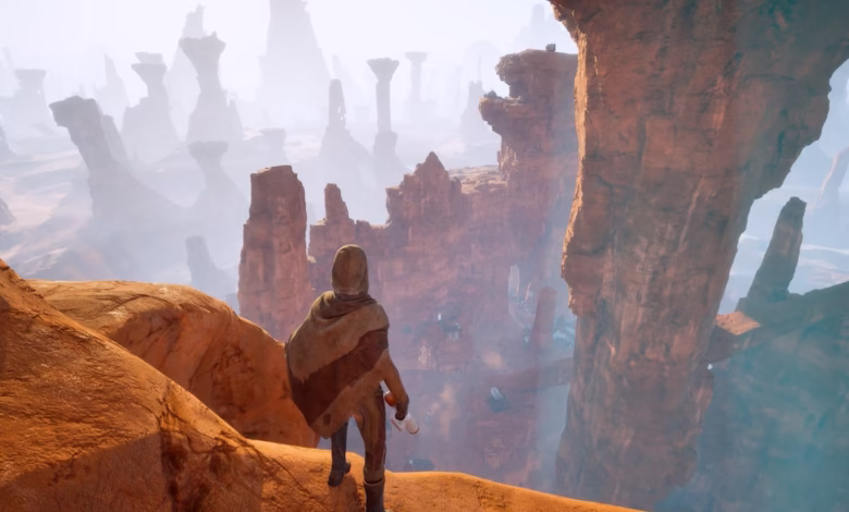 A lone figure stands on a cliff overlooking a vast, misty desert canyon with towering rock formations.