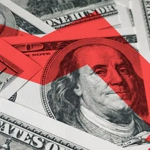 Close-up of US dollar bills with a red arrow pointing upward, suggesting economic growth or increase in value.
