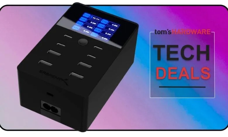 Black Sabrent power strip with multiple USB ports and a digital display showing power usage, featured in a Tom's Hardware Tech Deals graphic.